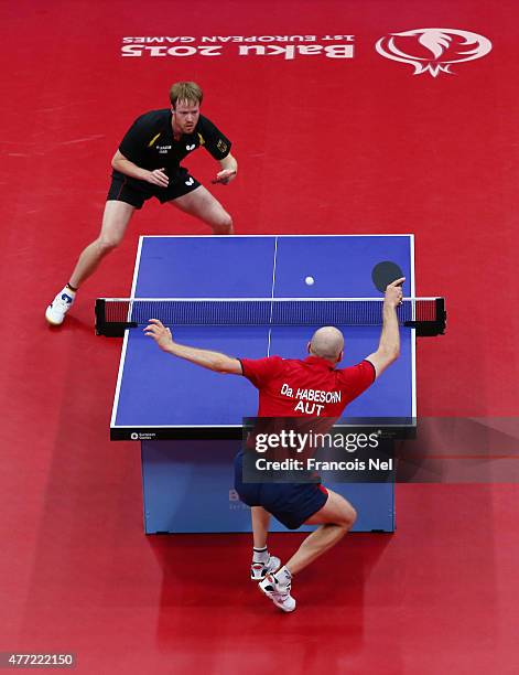Patrick Baum of Germany and Daniel Habesohn of Austria compete in the Men's Team Table Tennis bronze medal match during day three of the Baku 2015...
