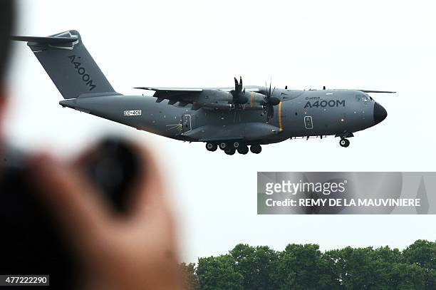 The Airbus A400M military transport plane prepares to land after its demonstration flight during the inauguration of the 51st International Paris Air...