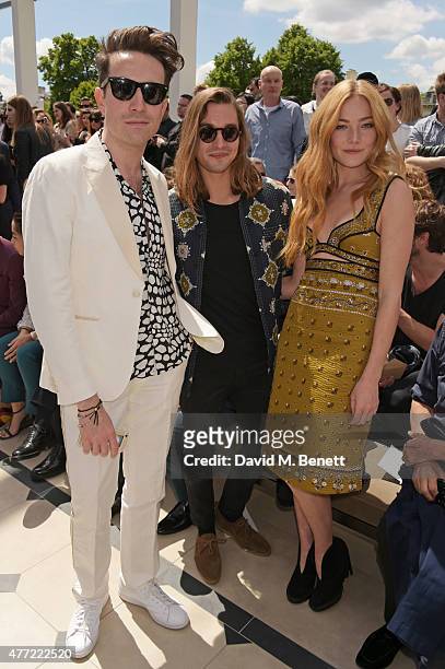 Nick Grimshaw, Oscar Tuttiett and Clara Paget attend the front row at Burberry Menswear Spring/Summer 2016 show at Kensington Gardens on June 15,...