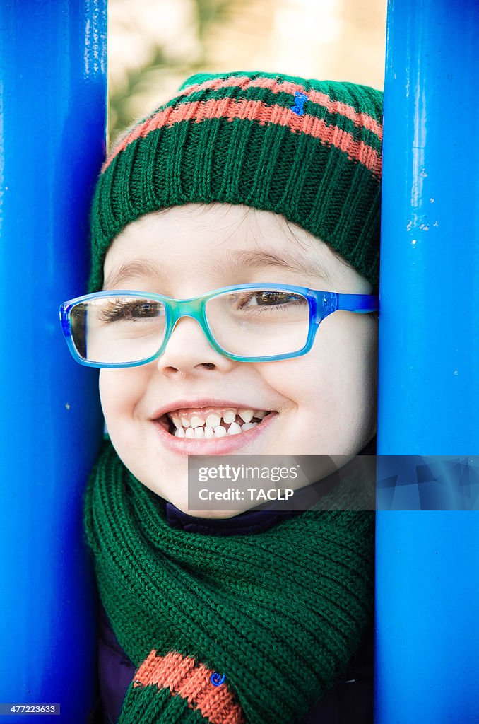 Boy at the park in a winter day