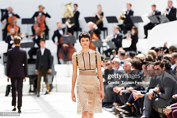 Model walks the runway at the Burberry Prorsum show during The London Collections Men SS16 at Kensington Gardens on June 15, 2015 in London, England.