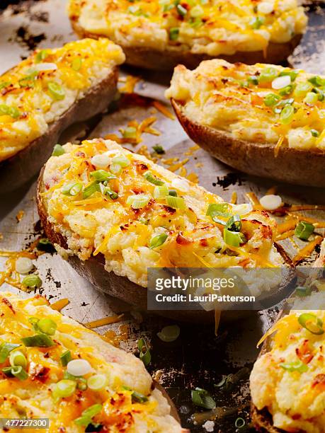 twice baked, stuffed potatoes with cheese and bacon - stuffed potato stock pictures, royalty-free photos & images