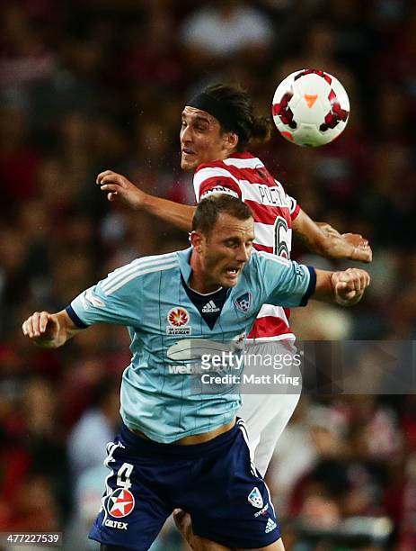 Ranko Despotovic of Sydney FC competes with Jerome Polenz of the Wanderers during the round 22 A-League match between Sydney FC and the Western...