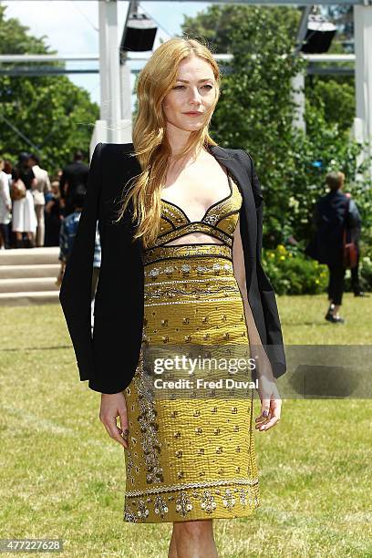 Clara Paget arrives at Burberry Menswear Spring/Summer 2016 show at Kensington Gardens on June 15, 2015 in London, England.