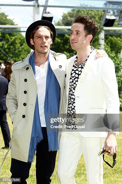 Sam Claflin and Nick Grimshaw arrive at Burberry Menswear Spring/Summer 2016 show at Kensington Gardens on June 15, 2015 in London, England.