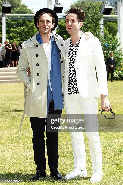 Sam Claflin and Nick Grimshaw arrive at Burberry Menswear Spring/Summer 2016 show at Kensington Gardens on June 15, 2015 in London, England.