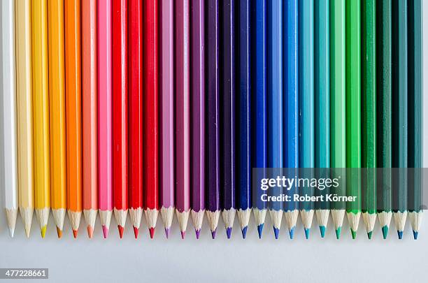 arrangement of colored pencils - colored pencil stock pictures, royalty-free photos & images