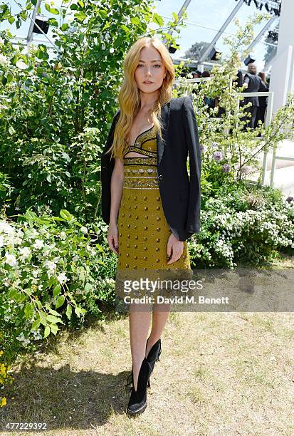 Clara Paget arrives at the Burberry Menswear Spring/Summer 2016 show at Kensington Gardens on June 15, 2015 in London, England.