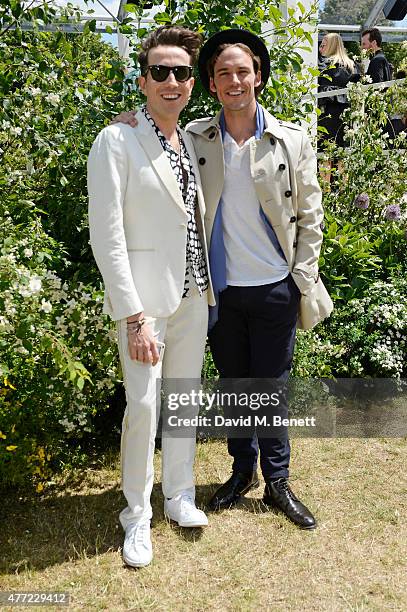 Nick Grimshaw and Sam Claflin arrive at the Burberry Menswear Spring/Summer 2016 show at Kensington Gardens on June 15, 2015 in London, England.