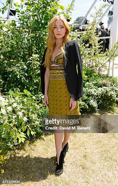 Clara Paget arrives at the Burberry Menswear Spring/Summer 2016 show at Kensington Gardens on June 15, 2015 in London, England.