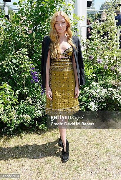 Clara Paget arrives at the Burberry Menswear Spring/Summer 2016 show at Kensington Gardens on June 15, 2015 in London, England.