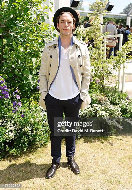 Sam Claflin arrives at the Burberry Menswear Spring/Summer 2016 show at Kensington Gardens on June 15, 2015 in London, England.