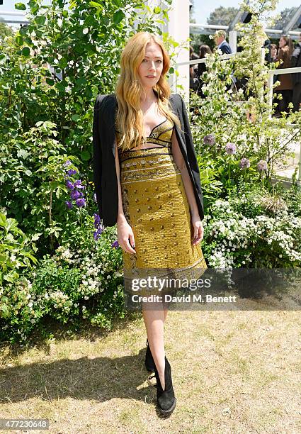 Clara Paget arrives at the Burberry Menswear Spring/Summer 2016 show at Kensington Gardens on June 15, 2015 in London, England.