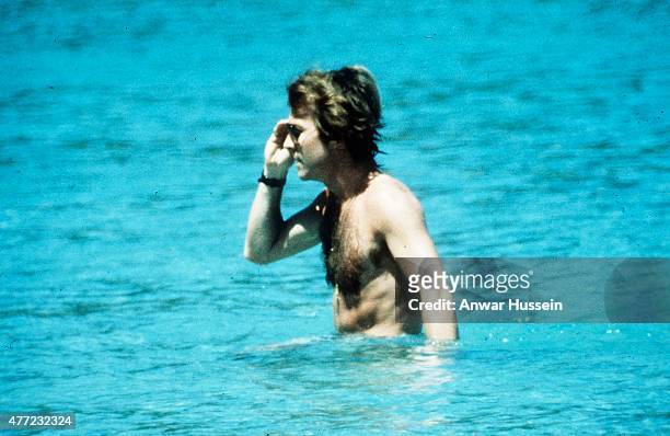 Roddy Llewellyn swims with Princess Margaret whilst on holiday on February 01, 1976 in Mustique, West Indies.