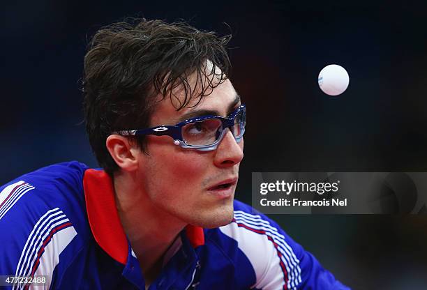 Adrien Mattenet of France competes during the Men's Table Tennis Team gold medal match against Tiago Apolonia of Portugal during day three of the...