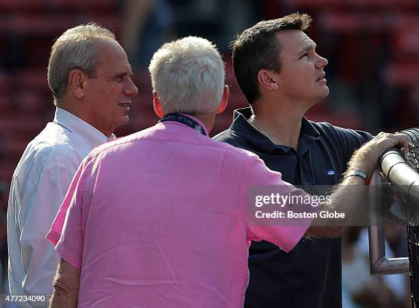 Boston Red Sox President and CEO Larry Lucchino and Red Sox Executive Vice President and General Manager Ben Cherington on the field before today's...