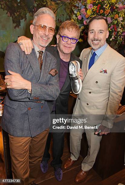 Patrick Cox, Sir Elton John and David Furnish attend the LATHBRIDGE by Patrick Cox presentation and official launch during London Collections Men...