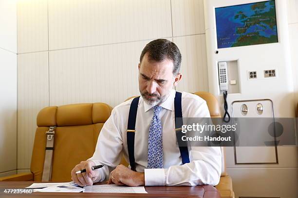 In this handout image provided by Spanish Royal House, King Felipe VI of Spain prepares his speech during a state visit to France on June 2, 2015 in...