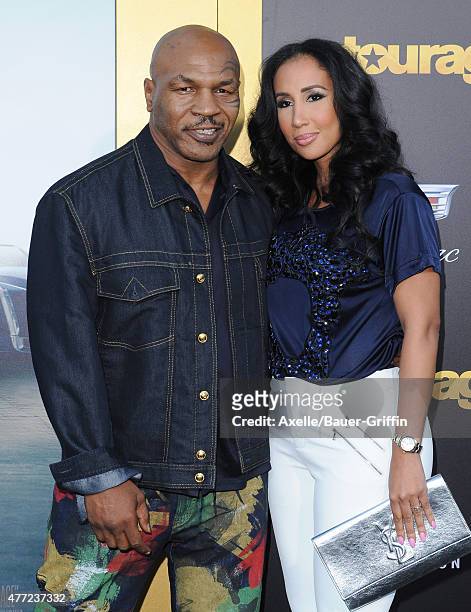 Boxer Mike Tyson and Kiki Tyson arrive at the Los Angeles premiere of 'Entourage' at Regency Village Theatre on June 1, 2015 in Westwood, California.