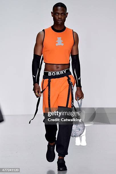 Model walks the runway at the Bobby Abley Spring Summer 2016 fashion show during London Menswear Fashion Week on June 15, 2015 in London, United...