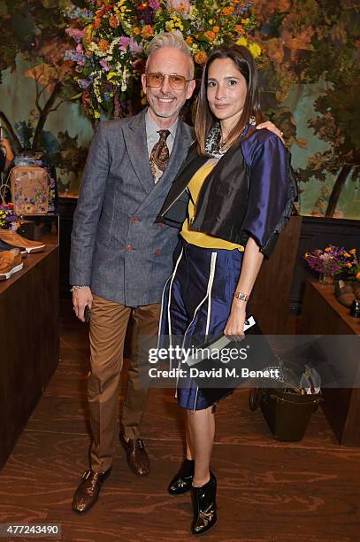 Patrick Cox and Astrid Munoz attend the LATHBRIDGE by Patrick Cox presentation and official launch during London Collections Men SS16 at Sketch on...