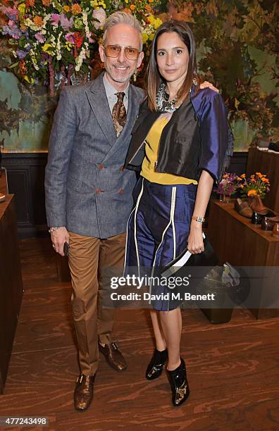 Patrick Cox and Astrid Munoz attend the LATHBRIDGE by Patrick Cox presentation and official launch during London Collections Men SS16 at Sketch on...