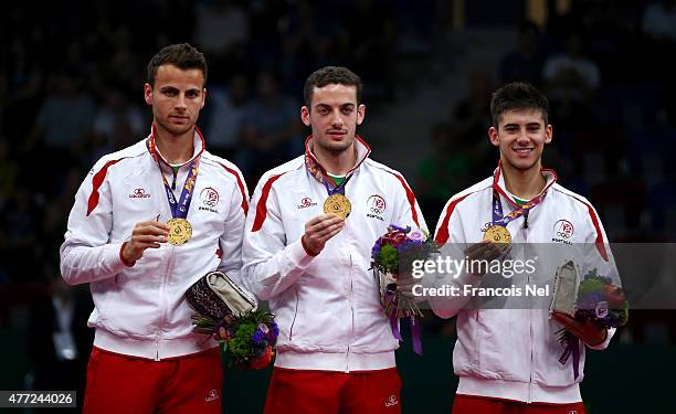 Gold medalists Tiago Apolonia, Marcos Freitas and Joao Geraldo of Portugal pose during the medal ceremony for Men's Table Tennis Team Final on day...