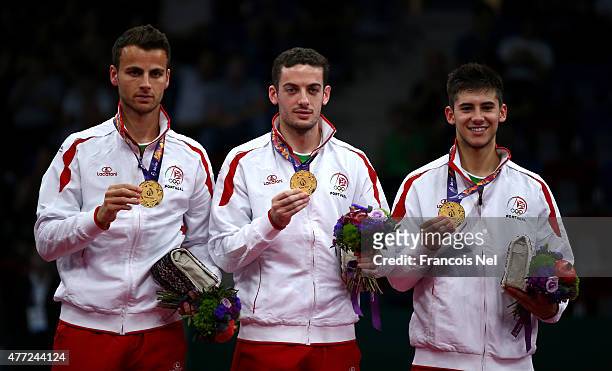 Gold medalists Tiago Apolonia, Marcos Freitas and Joao Geraldo of Portugal pose during the medal ceremony for Men's Table Tennis Team Final on day...