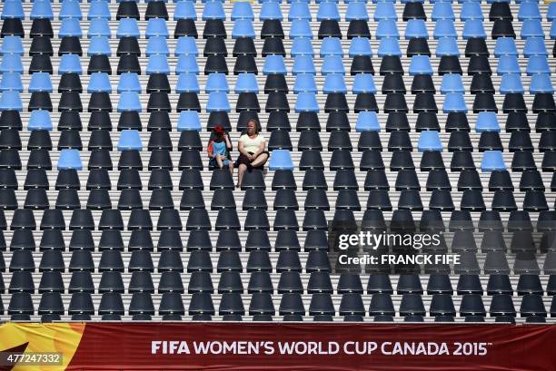 Fans wait for the start of the Group B football match at the 2015 FIFA Women's World Cup between Ivory Coast and Norway at Moncton Stadium, New...