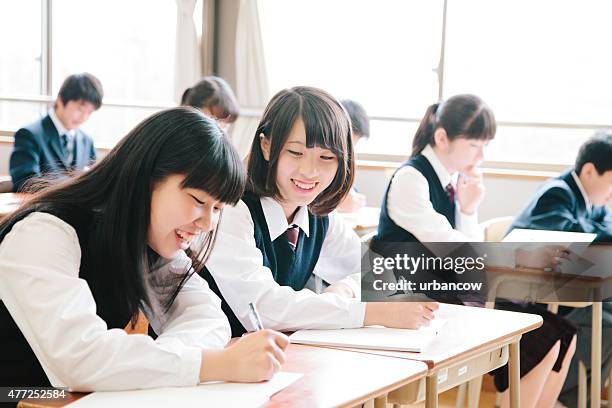 high school students, teenagers study happily in a classroom, japan - woman uniform stock pictures, royalty-free photos & images