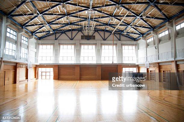 japanese high school. an empty school gymnasium. basketball court markings - sport venue stock pictures, royalty-free photos & images