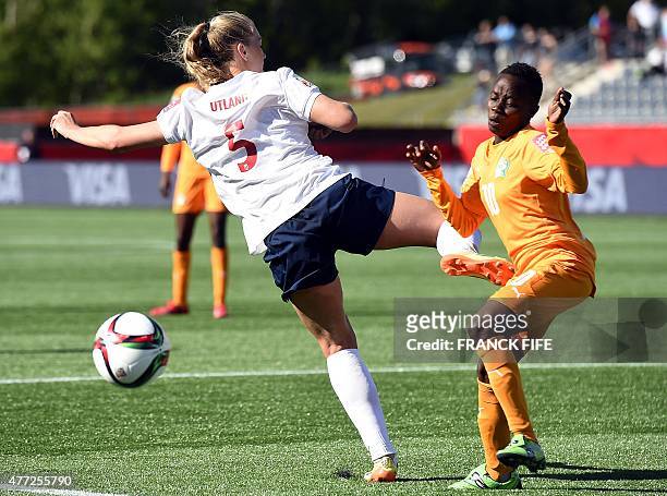 Norway's forward Lisa-Marie Utland vies with Ivory Coast's defender Ange Nguessan during a Group B match at the 2015 FIFA Women's World Cup between...