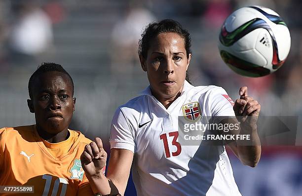 Ivory Coast's forward Ange Nguessan vies with Norway's defender Ingrid Moe Wold during a Group B football match at the 2015 FIFA Women's World Cup...