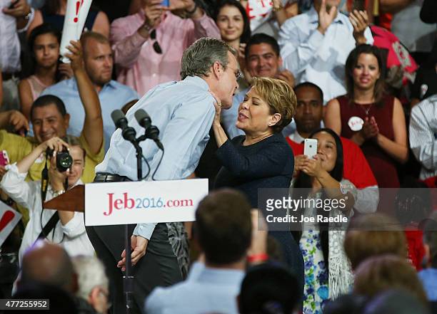 Former Florida Governor Jeb Bush greets his wife Columba Bush after announcing his plan to seek the Republican presidential nomination during an...