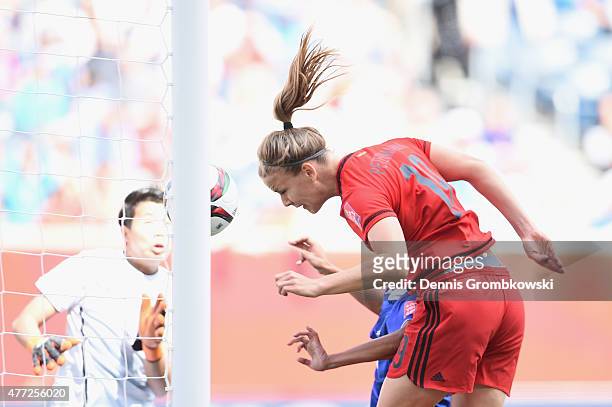 Lena Petermann of Germany heads the second goal during the FIFA Women's World Cup Canada 2015 Group B match between Thailand and Germany at Winnipeg...