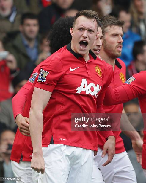 Phil Jones of Manchester United celebrates scoring their first goal during the Barclays Premier League match between West Bromwich Albion and...