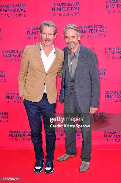 Lambert Wilson and Jeremy Irons attends the 'Une famille a louer' Premiere during the 4th Champs Elysees Film Festival at Publicis Cinemas on June...