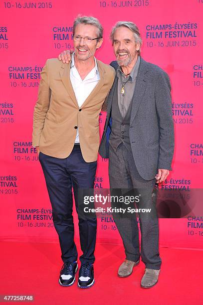 Lambert Wilson and Jeremy Irons attends the 'Une famille a louer' Premiere during the 4th Champs Elysees Film Festival at Publicis Cinemas on June...