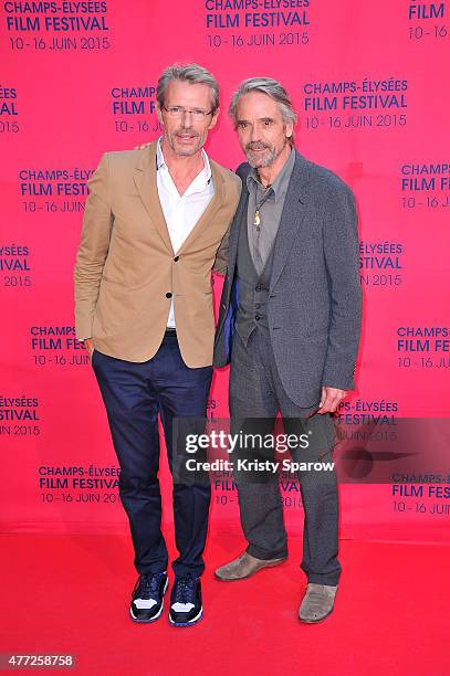 Lambert Wilson and Jeremy Irons attends the 'Une famille a louer' Premiere during the 4th Champs Elysees Film Festival at Publicis Cinemas on June...