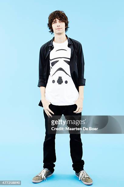 Actor Devon Bostick from 'The 100' poses for a portrait at the TV Guide portrait studio at San Diego Comic Con for TV Guide Magazine on July 24, 2014...