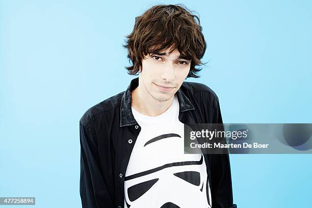 Actor Devon Bostick from 'The 100' poses for a portrait at the TV Guide portrait studio at San Diego Comic Con for TV Guide Magazine on July 24, 2014...