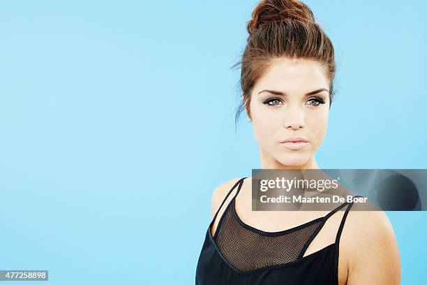 Actress Marie Avgeropoulos from 'The 100' poses for a portrait at the TV Guide portrait studio at San Diego Comic Con for TV Guide Magazine on July...