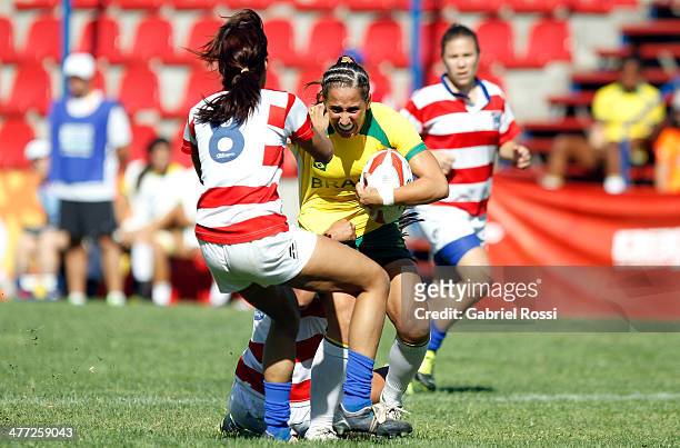 Angelica Pereira Gevaerd of Brazil conducts the ball during women's rugby qualifiers match between Paraguay and Brazil during day two of the X South...