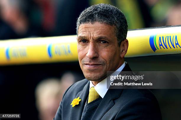 Chris Hughton the Norwich manager looks on during the Barclays Premier League match between Norwich and Stoke at Carrow Road on March 8, 2014 in...