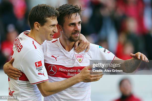 Martin Harnik of Stuttgart celebrates his team's second goal with team mate Daniel Schwaab during the Bundesliga match between VfB Stuttgart and...