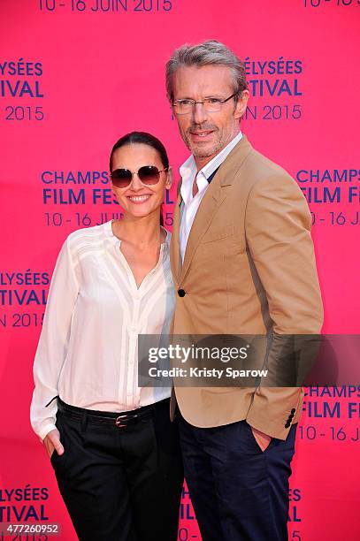 Virginie Ledoyen and Lambert Wilson attend the 'Une famille a louer' Premiere during the 4th Champs Elysees Film Festival at Publicis Cinemas on June...