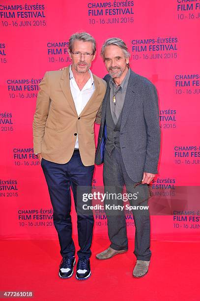 Lambert Wilson and Jeremy Irons attends the 'Une famille a louer' Premiere during the 4th Champs Elysees Film Festival at Publicis Cinemas on June...