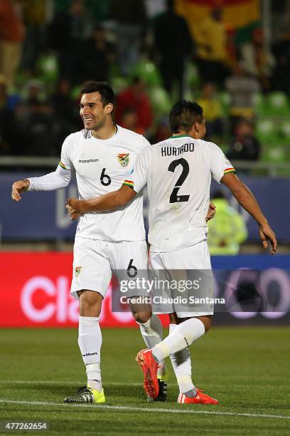 Danny Bejerano and Miguel Hurtado of Bolivia celebrate after the 2015 Copa America Chile Group A match between Ecuador and Bolivia at Elias Figueroa...