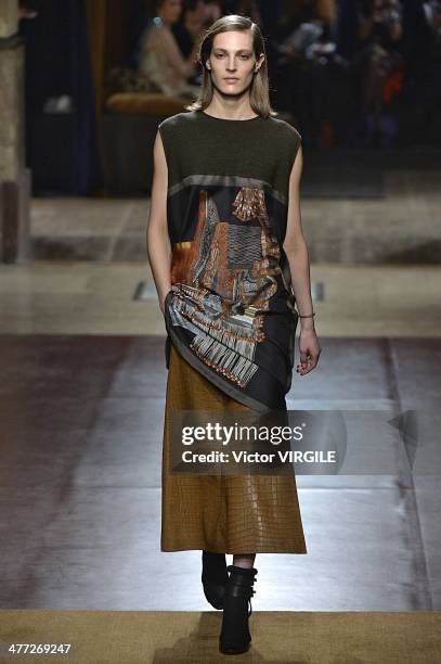 Model walks the runway during the Hermes Ready to Wear Fall/Winter 2014-2015 show as part of the Paris Fashion Week Womenswear Fall/Winter 2014-2015...