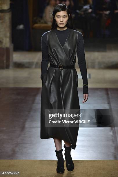 Model walks the runway during the Hermes Ready to Wear Fall/Winter 2014-2015 show as part of the Paris Fashion Week Womenswear Fall/Winter 2014-2015...